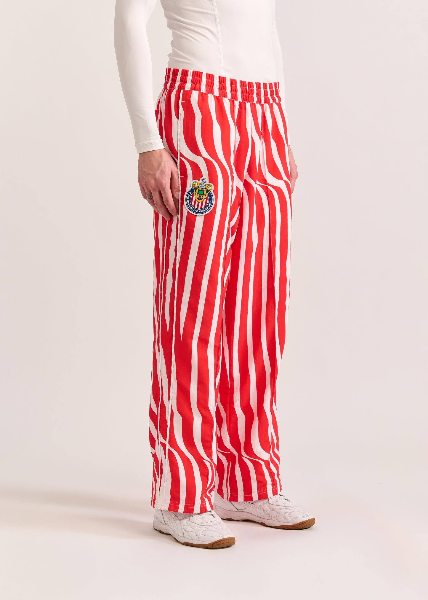 PUMA X LYM X CHIVAS RED AND WHITE SWIRL SPORT PANTS SELECT